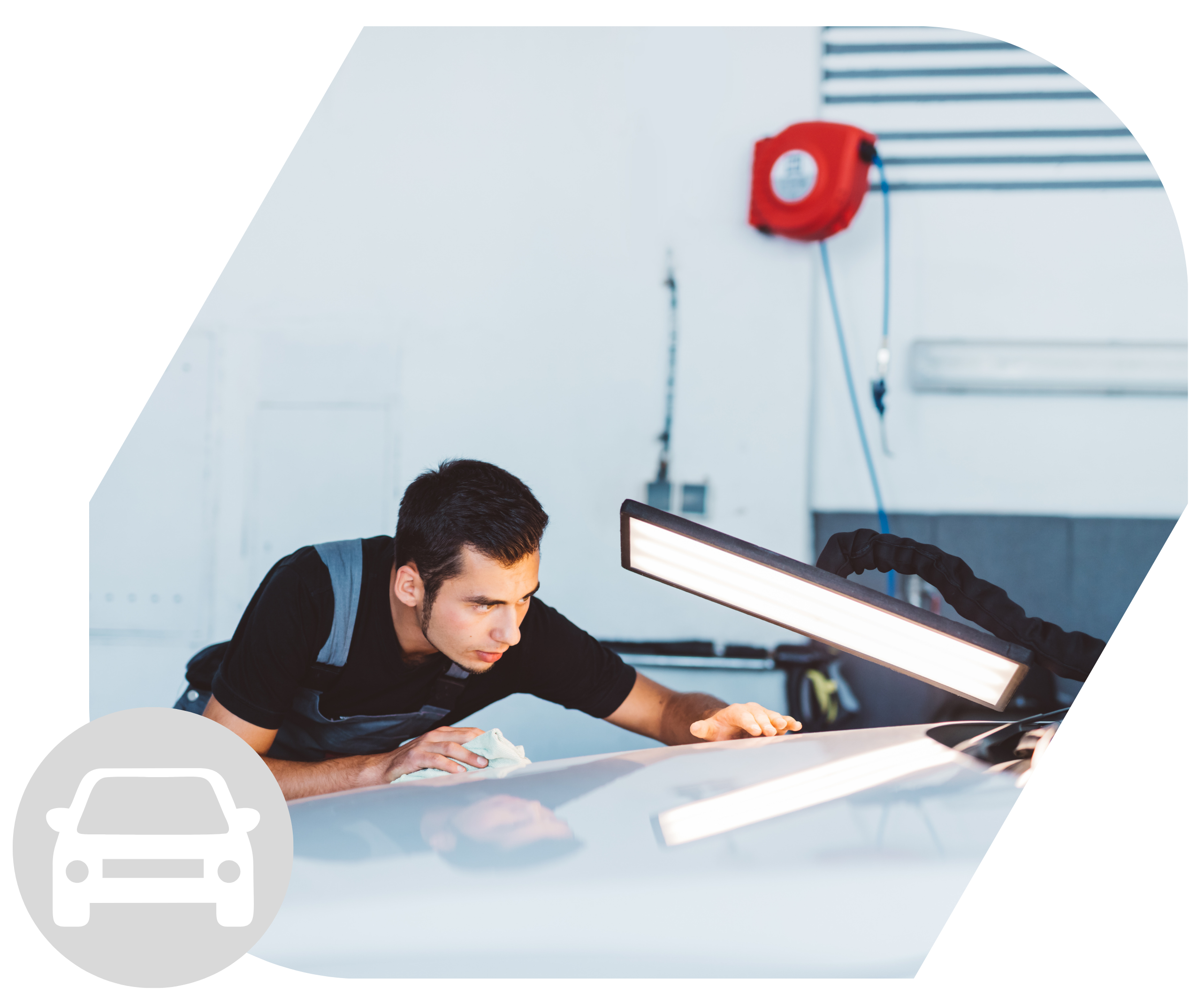 Mechanic smoothing surface of car after spray painting